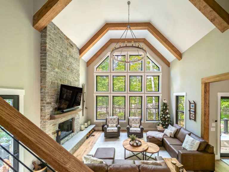 Living area with ceiling high windows.